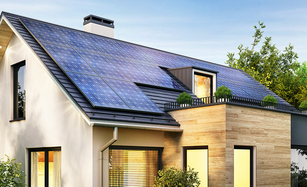 Solar powered home with solar panels on roof. Go solar now